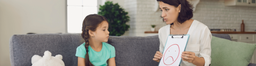 Mother explaining something to her daughter